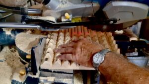 Maurice Betournay cuts wood for a new project with Art Borups Corners.