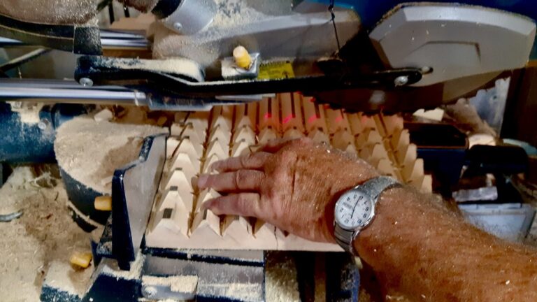 Maurice Betournay cuts wood for a new project with Art Borups Corners.