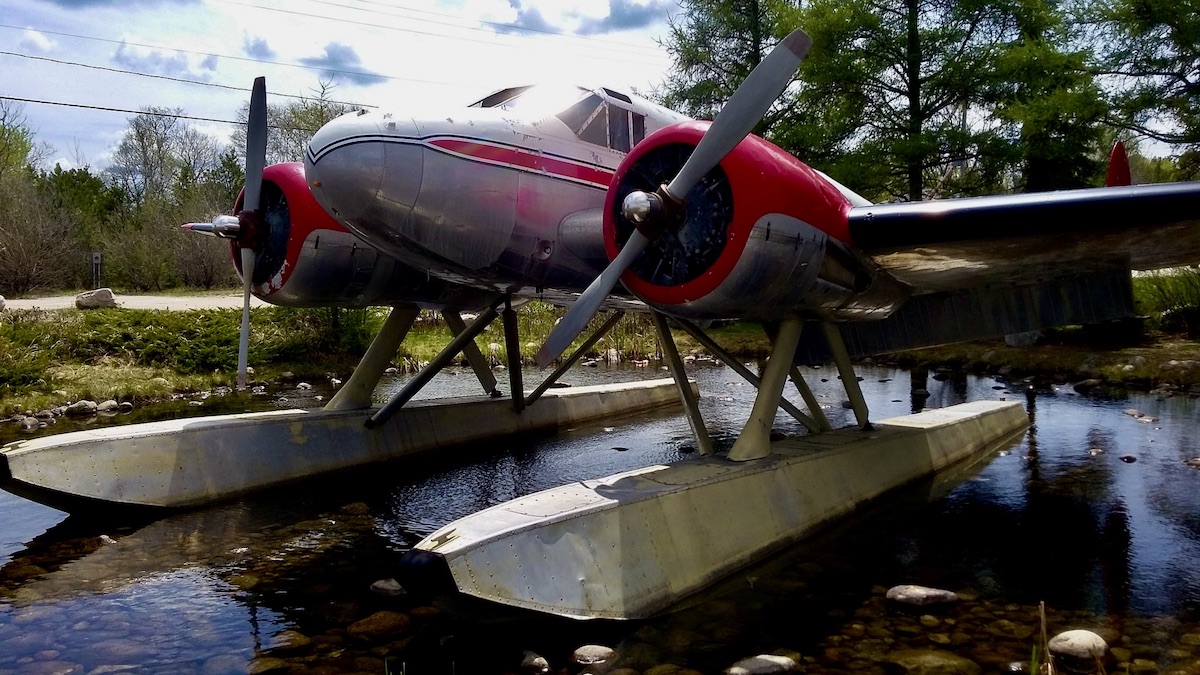 Ignace, Ontario's historic Beech 18 Expeditor, a former RCAF aircraft, beautifully preserved on its watery perch along the Trans-Canada Highway.