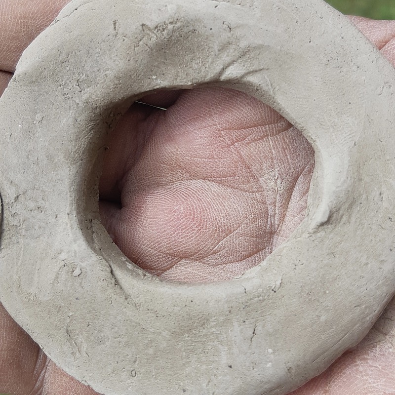 The results after a few hours in the sun. The clay is completely bone-dry, but the original assembly crease on the left hasn't budged or cracked open. This local Melgund Township mud has incredible natural stability.