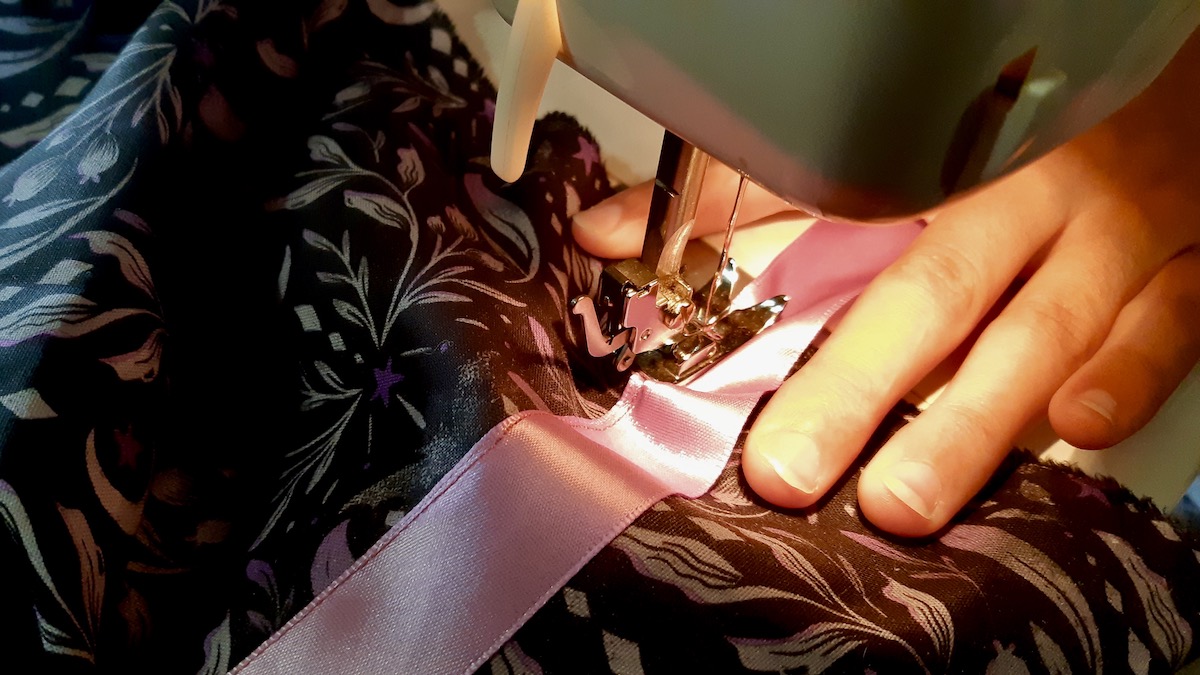 Stitch by stitch, the final details are coming together as youth build their sewing skills and bring their ribbon skirts to life.