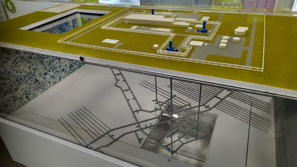 A detailed 3D model on display inside the mobile unit illustrates how surface facilities connect to the underground repository deep within the rock.