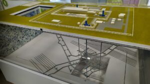A detailed 3D model on display inside the mobile unit illustrates how surface facilities connect to the underground repository deep within the rock.