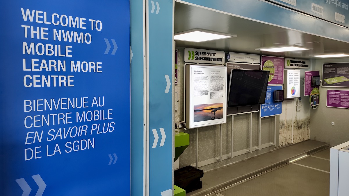 Inside the mobile unit, interactive touchscreens and bilingual displays greeted visitors looking to explore the details of the Deep Geological Repository project.