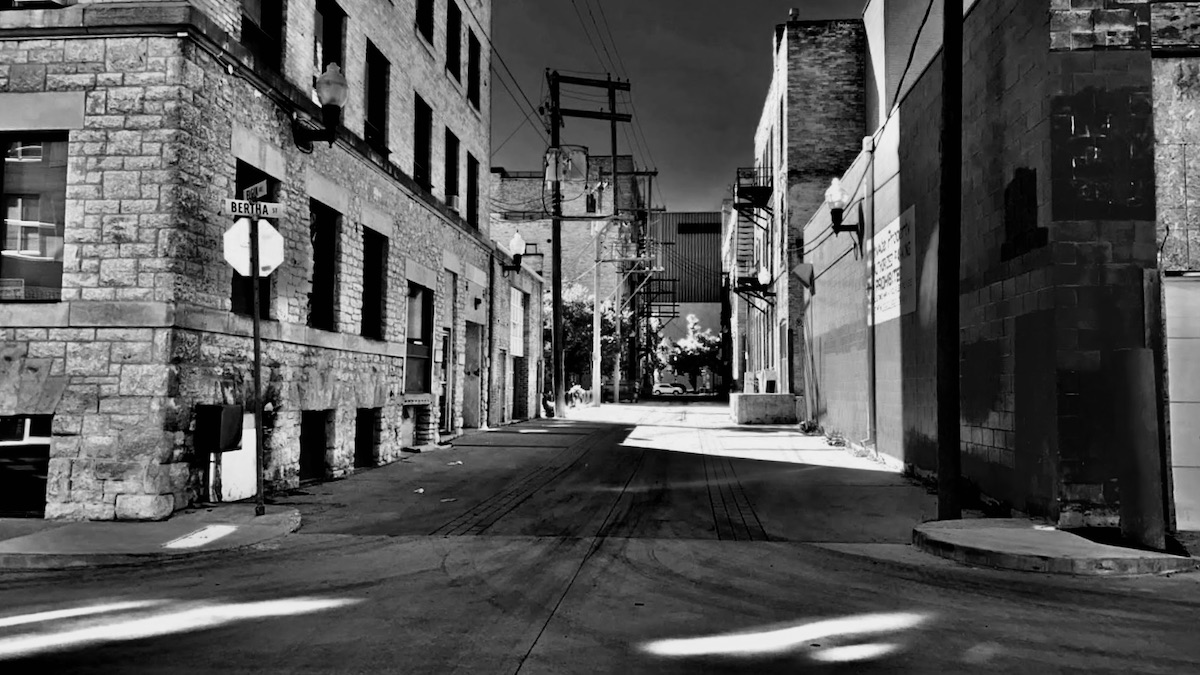 Through Winnipeg in Black and White, I’ve explored the hidden stories of the city, capturing moments where light, shadow, and silence reveal deeper connections to place. This series, shaped by both photography and digital editing, invites viewers to reflect on the urban landscape from an Indigenous youth perspective.