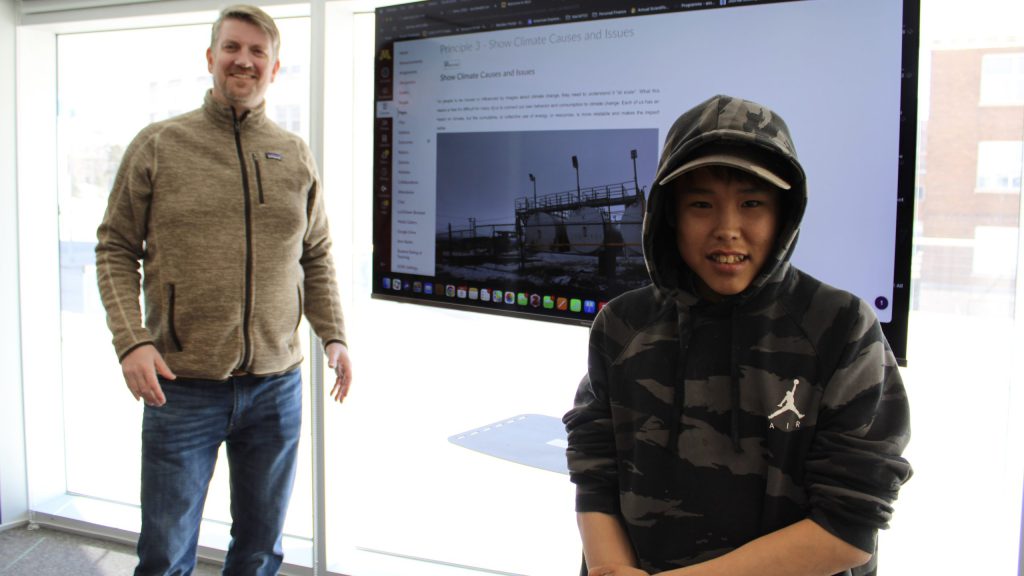 Dr. Olaf Kuhlke from the Minneapolis College of Art and Design and Arts Incubator founding member Tony Eetak participate in a workshop for the Canada-US project Our People Our Climate in Winnipeg, Manitoba, highlighting the role of climate diplomacy in fostering collaboration across borders.