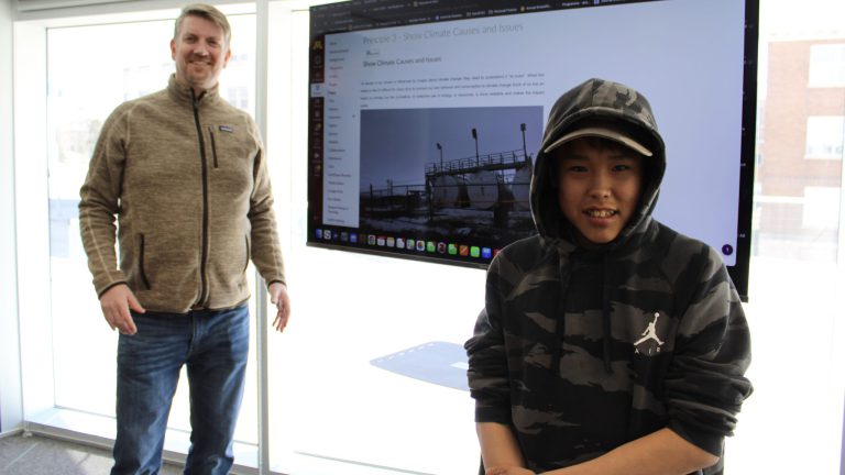 Dr. Olaf Kuhlke from the Minneapolis College of Art and Design and Arts Incubator founding member Tony Eetak participate in a workshop for the Canada-US project Our People Our Climate in Winnipeg, Manitoba, highlighting the role of climate diplomacy in fostering collaboration across borders.