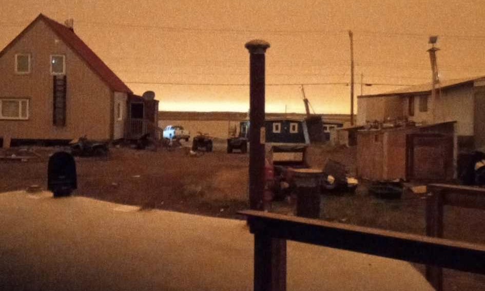 Niriqatiginnga team member Tony Eetak captured this photo in Arviat, Nunavut of smoke from fires in the Northwest Territories making the sky orange.