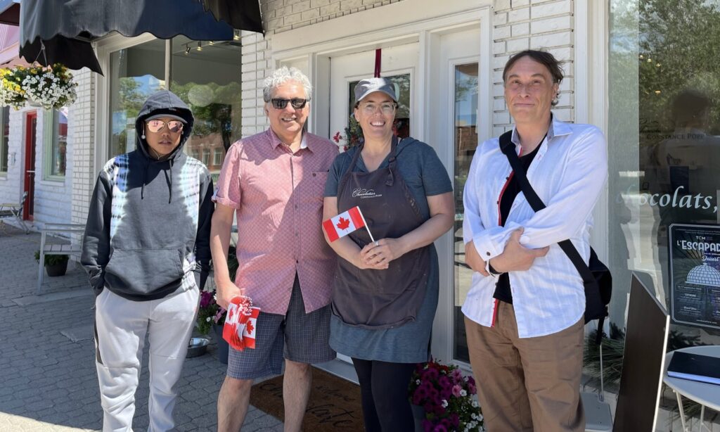 Tony Eetak, Hon. Dan Vandal, Constance Menzies and Jamie Bell took in the sights and sounds outside Chocolatier Constance Popp during the start of this year’s Canada Day long weekend in Historic St. Boniface.