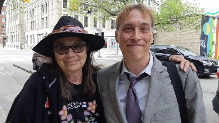 Winnipeg arts leaders Val Vint and Jamie Bell catch up outside the Urban Shaman Art Gallery during a recent gathering held by the Canada Council for the Arts and Manitoba Arts Council. Photo: Debbie Keeper
