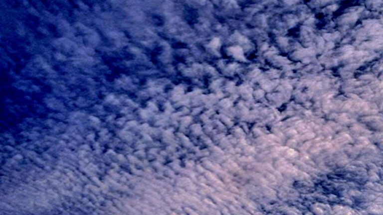 The sky above the Arctic doesn’t shout. It murmurs. These clouds are not weather — they are memory in motion, frost turned to breath, breath returned to sky. Look too long and you forget where you end and the sky begins. Up here, nothing is separate. Everything floats.