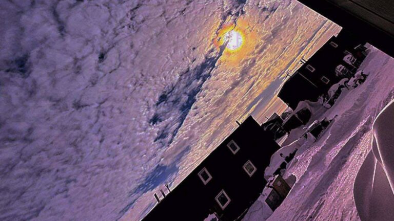 The sky folded under the weight of something forgotten. The buildings stay still not because they want to, but because they’ve been asked to remember a world that no longer runs upright. What if time shifted its axis, and only snow noticed?