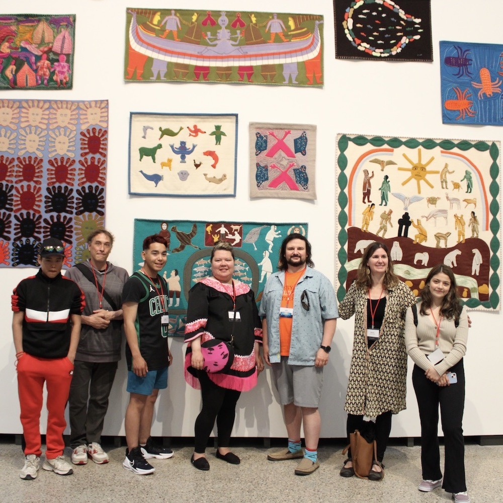 We come together at Qaumajuq not as strangers, but as echoes—called into the same light. The space holds us gently, like breath caught in a moment of knowing. Each step on the stone floor feels like a continuation, not a beginning. Here, collaboration feels like remembering. Voices blend, not to rise above, but to ripple outward—soft, certain. We build together in fragments and rhythms, trusting the silence as much as the sound.