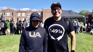 Tony Eetak and Alan Greyeyes catch up at the sākihiwē festival in Winnipeg, Manitoba this week.