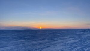 Sun and ice. We stand here, on the edge of forever. Where does the light lead us? What will we find on the other side? That horizon... it's shifting, changing, like the world beneath our feet. This isn't just a view; it's our story, written in ice and light, waiting to be told.