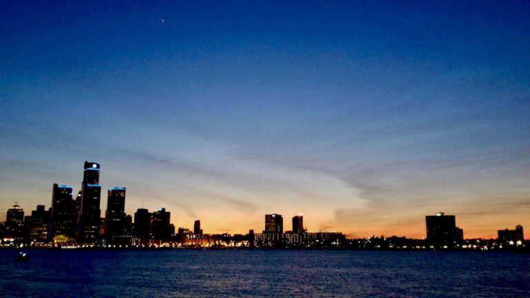 That serene moment when the Detroit skyline lights up against a summer twilight sky. Perfect calm on the river.