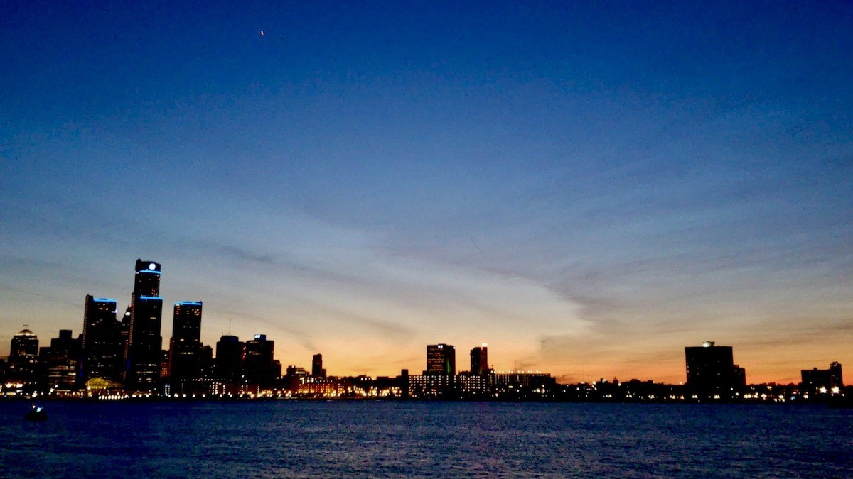 That serene moment when the Detroit skyline lights up against a summer twilight sky. Perfect calm on the river.