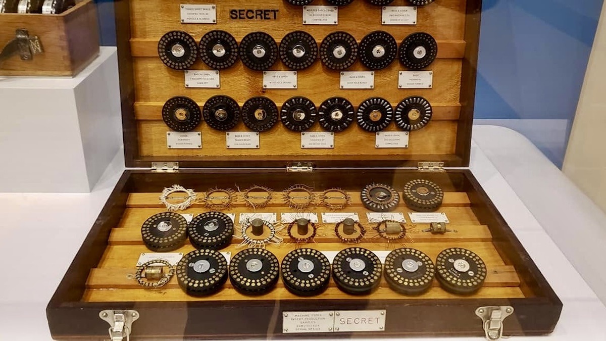 A full set of Enigma rotors, showcasing the sophisticated mechanics behind WWII's most famous cipher.