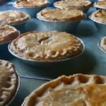 Golden, flaky crusts hide rich, savory fillings brimming with local ingredients. Each chicken pot pie tells a story.