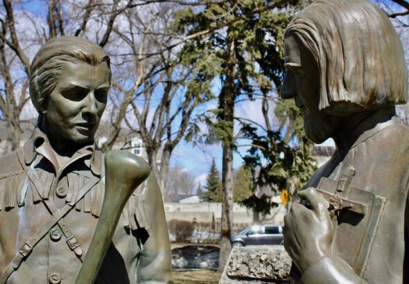 Local artist Helen Granger Young crafted these life-sized bronze figures to stand directly upon the cemetery's soil.