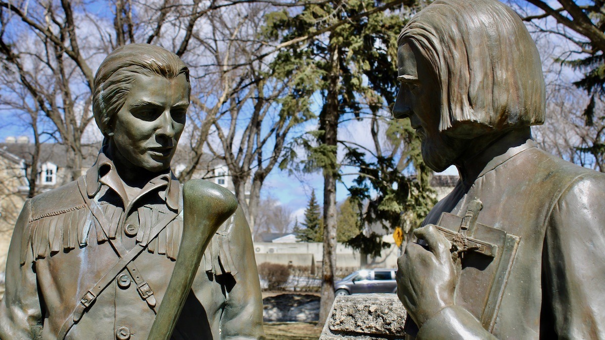 Local artist Helen Granger Young crafted these life-sized bronze figures to stand directly upon the cemetery's soil.