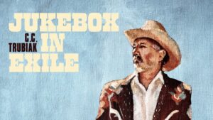 Jukebox In Exile is the latest country music album from Flin Flon, Manitoba singer-songwriter C.C. Trubiak. Rooted in classic country music traditions, the album combines heartfelt storytelling, honky-tonk influences and contemporary songwriting inspired by life in Northern Manitoba. Written during a period of wildfire evacuation and displacement, Jukebox In Exile reflects the resilience, creativity and strong community spirit found throughout Flin Flon and across Manitoba. Featuring the singles "Old Country Songs," "Being Rich" and "Outlaws Meditation," the album highlights Trubiak's growing presence in Canadian country music while celebrating the people, places and experiences that shape life in Manitoba's North.